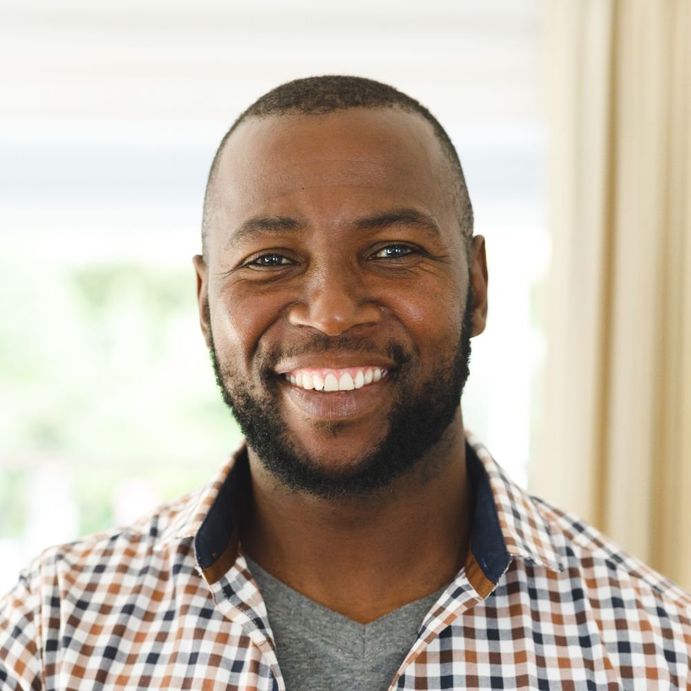 Portrait Of African American Man Smiling And Looki 8YSWGYH