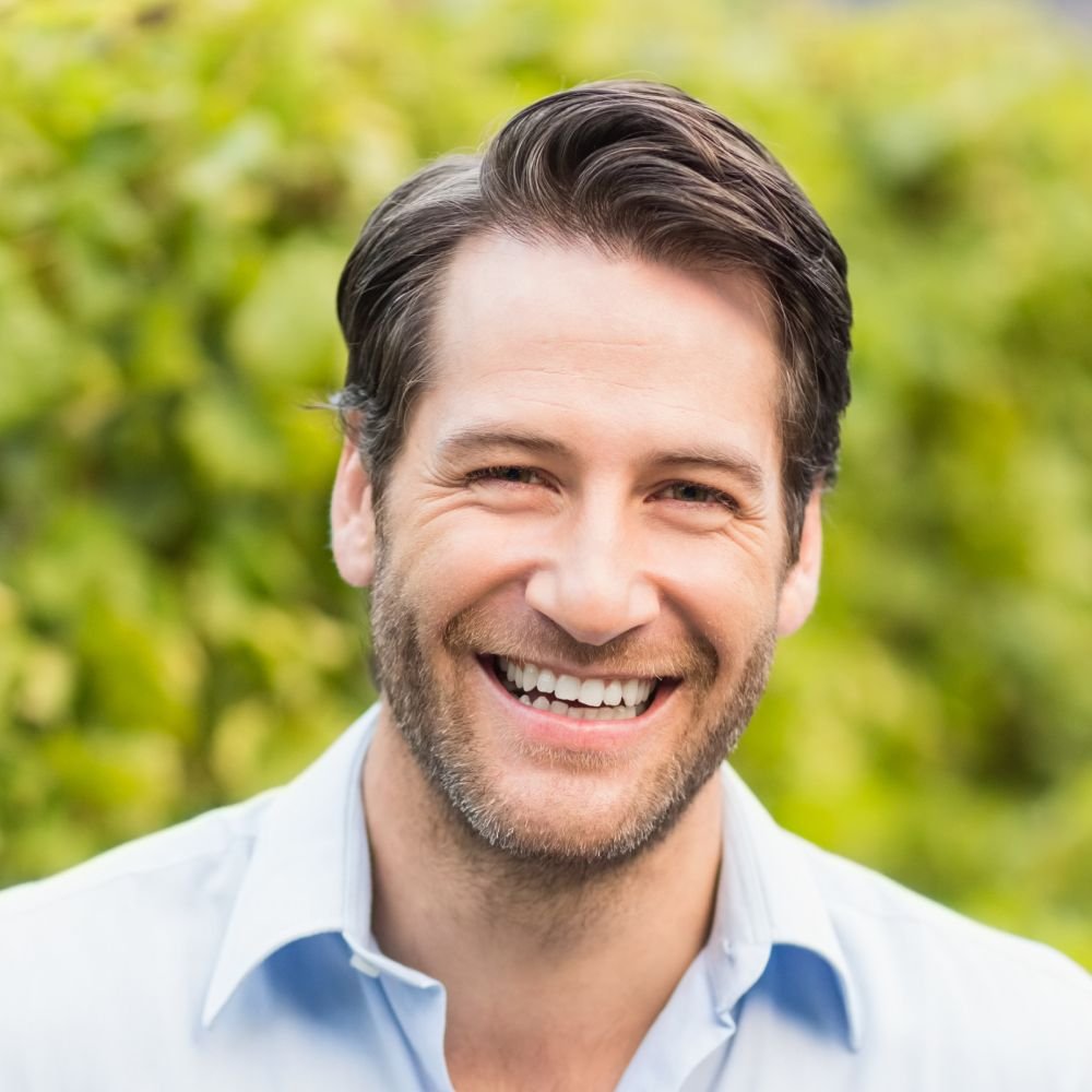 Young Happy Man Smiling At Camera In The Grape Fie PH96PL7